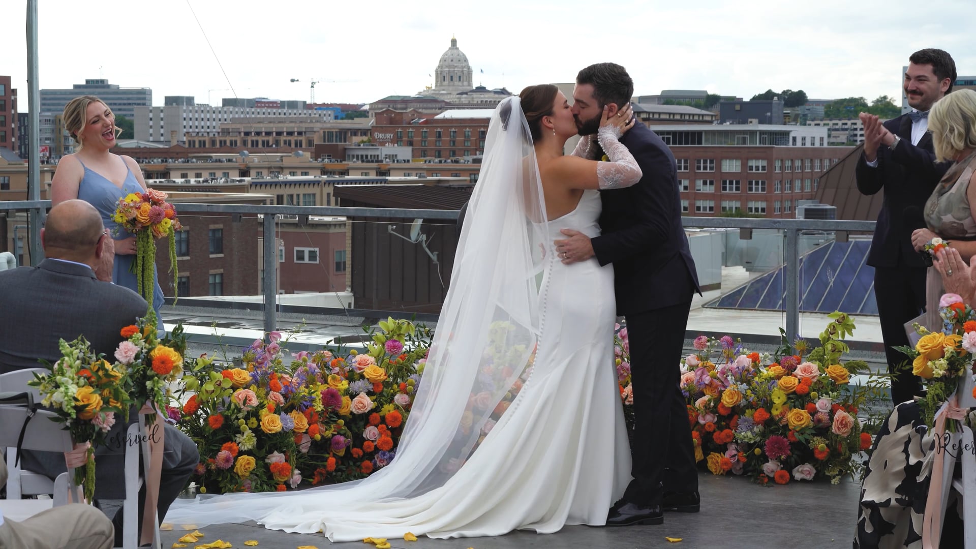 Anna and Ryan sharing a kiss on their wedding day